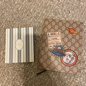 Gucci and Dior notebooks